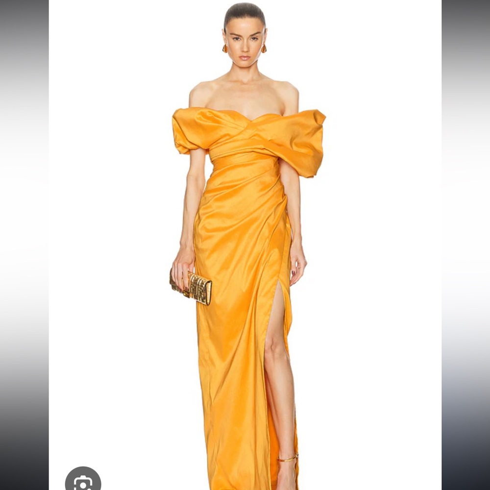 Rachel Gilbert hold gia gown